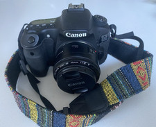 Canon EOS 60D, 50mm lens, Charger, 32Gb SD card, cables, 3 Batteries