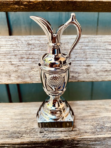Golf trophy tall - 🏆,