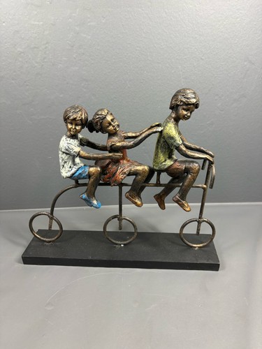 Vintage children riding triple - children,
