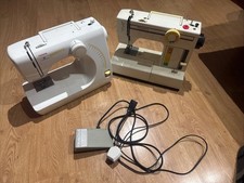 Two Toyota Sawing Machines