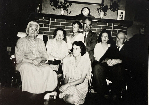 1940s family indoors - family, fireplace