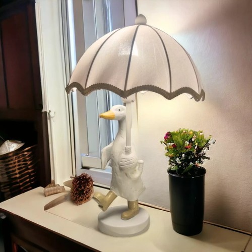White resin duck - duck, umbrella