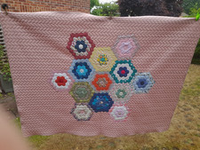 Hexie quilt, multicoloured on