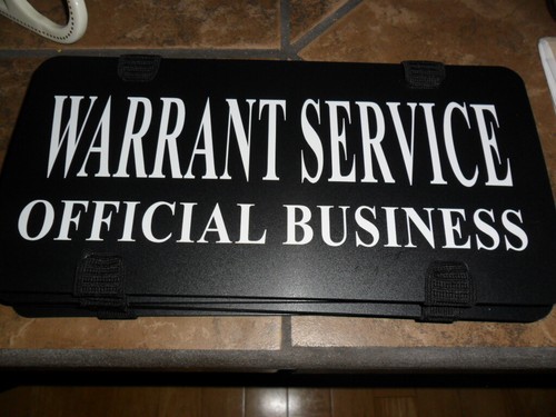 Warrant service official - service,