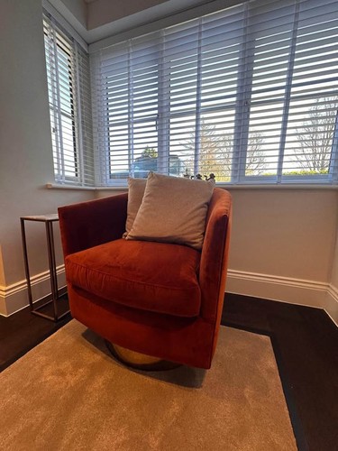Burnt orange swivel chair - chair,
