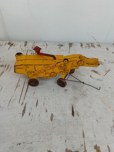 Arcade cast iron toy mccormick - iron,