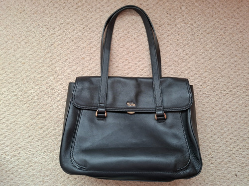 Used black tula leather - used,