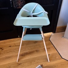 Stokke Clikk High Chair in Green with harness and foot rest. 