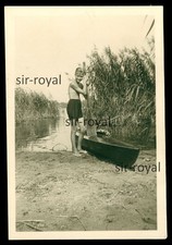 Blonde Jungmann with Canoe