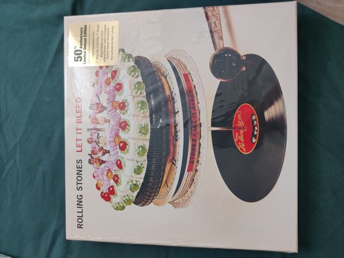 Unopened rolling stones let - rolling,