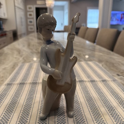 Lladro 4614 boy with - 4614,