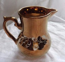 Wade jug hand painted bronze