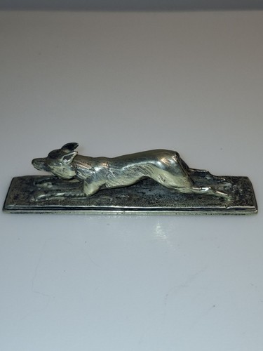 Antique silver running fox