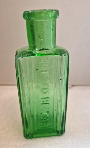 Antique green glass poison - green,