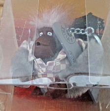 Kipling Monkey Keyring Bag Charm - Monkey Named Nathan Carrying A Surfboard