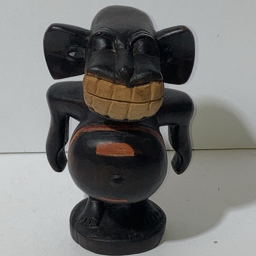 Cheeky african wooden hand - cheeky,