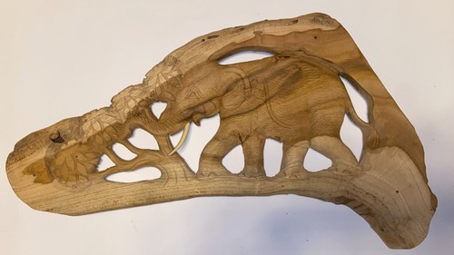 Hand carved wooden baby calf - hand,