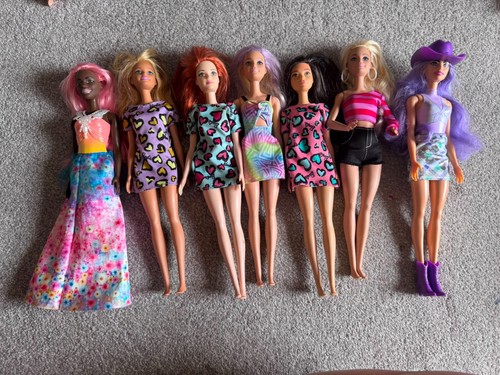 Seven barbie dolls various - seven,