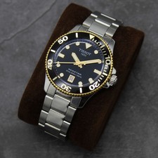 Tissot Seastar 36mm Black and Gold T1202102105100