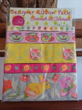 Tula Pink ribbons Curiouser &