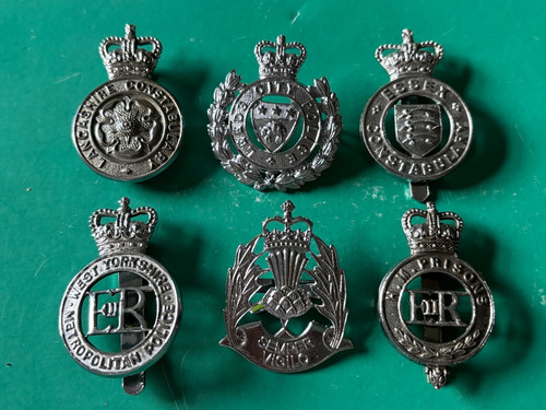 Vintage police cap badges - x,