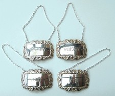 SET OF FOUR SILVER PLATED DECANTER LABELS WHISKY, SHERRY, PORT & GIN