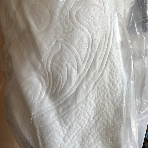 Fabric for recovering quilted - for,