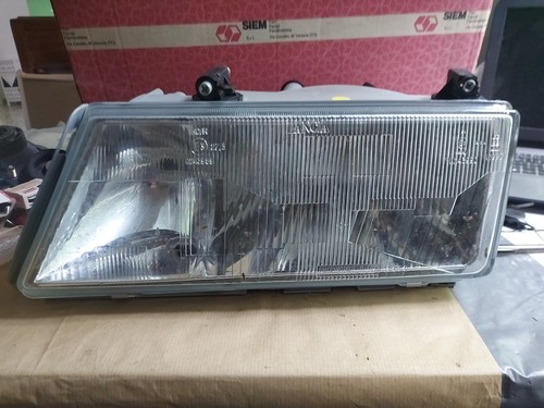 Front left headlight lancia - front,