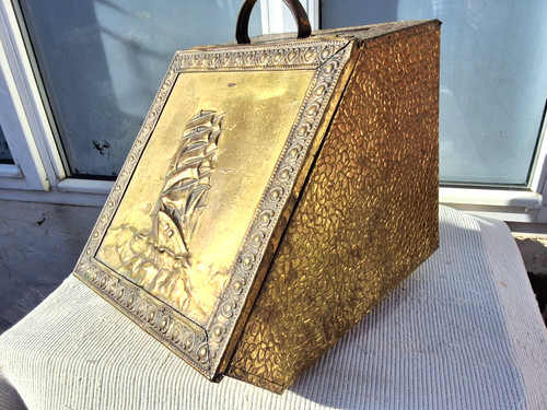 Vintage embossed brass - on, wood
