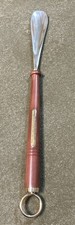Long Handed shoe horn - brass and wood with witty phrase