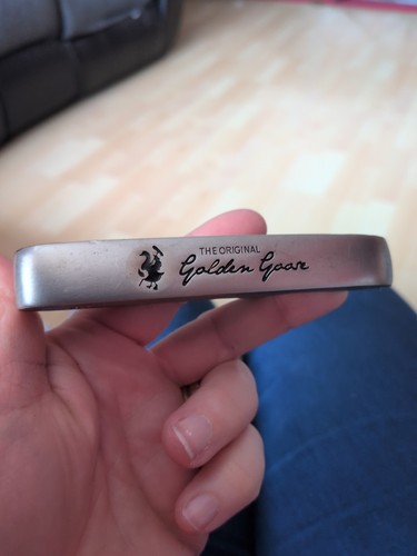 Golden goose putter - goose,