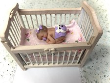 Newborn baby doll dollhouse