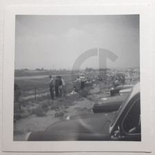 Spectators Standing by Road Race Track: 1950's Snapshot Photo