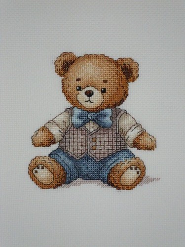 Completed cross stitch teddy - cross,