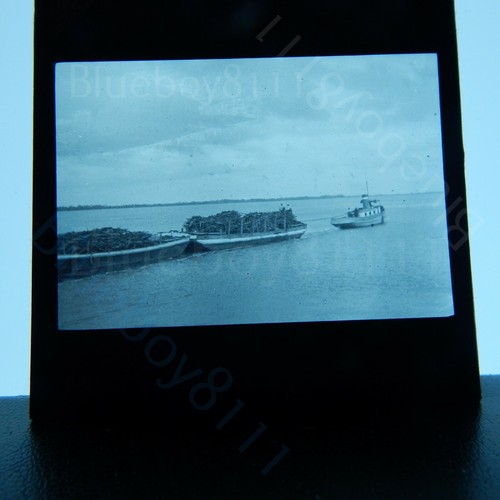 Steam tug boat pulling scrap - steam,