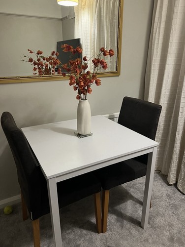 White dining table with chairs