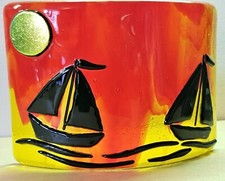 Sailing boats in sunset