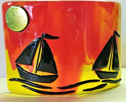 Sailing boats sunset - in,