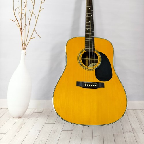 Natural wood acoustic guitar - natural,
