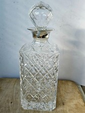 Decanter with silver plate rim 25.5x9.25cm weight 1.420kg in good condition