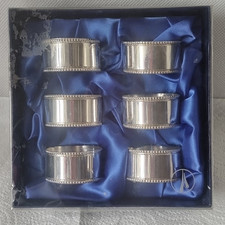 SET OF 6 SILVER METAL NAPKIN RINGS Circular Bead Design Boxed