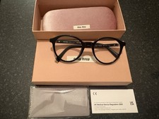 Miu Miu Black Round Glasses