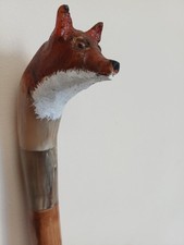 A Fox Carved In horn Fitted On A Stiped Sweet Chestnut Shank Hand Painted