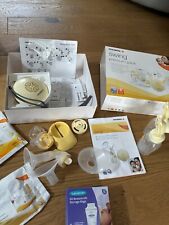 Medela Swing premium pack and 41 breast milk storage bags 