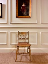 ANTIQUE REGENCY PAINTED CHAIR WITH CANE SEAT