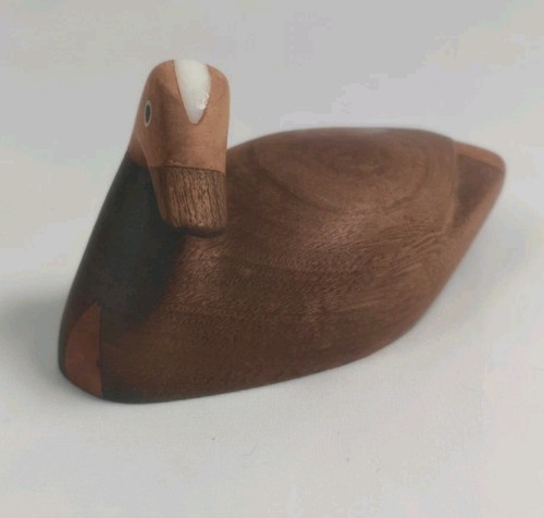 Hand carved wooden duck - hand,