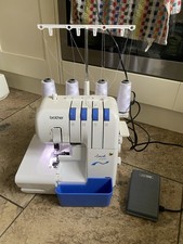 BROTHER 3034DWT OVERLOCKER SEWING MACHINE WITH FOOT PEDAL & INSTRUCTION BOOKLET