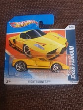 2010 Hotwheels Nightburnerz Ferrari Enzo In Yellow. 1:64 Scale On Short Card.