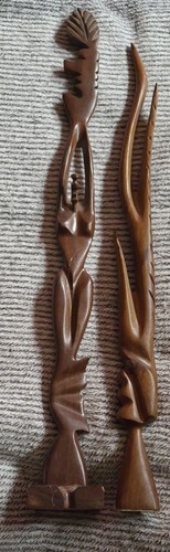 Pair african carved wooden - of,