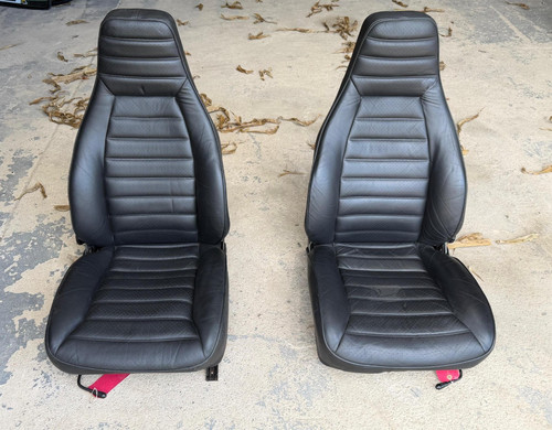 Original black front seats for